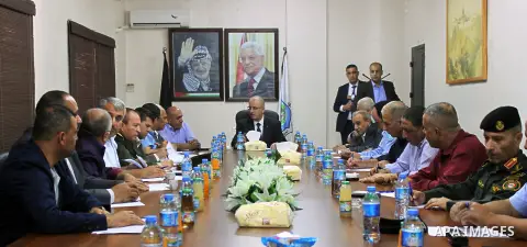 Palestinian Prime Minister Rami Hamdallah chairs a meeting with security chiefs, in the West Bank city of Nablus on July 08, 2016. Photo by Prime Minister Office