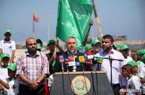 Senior Hamas Leader Ismail Redwan, speaks during a press conference to announce the start of summer camps organized by the Hamas movement in Gaza city on July 10, 2016. Hamas movement organized dozens of summer camps for...