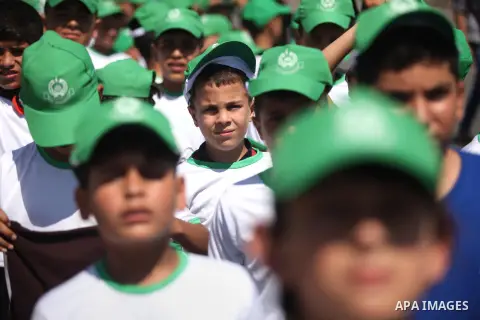 Palestinian children take part in a summer camp organized by Hamas movement in Gaza city on July 10, 2016. Hamas movement organized dozens of summer camps for Palestinian children during the period of school holidays. Ph...