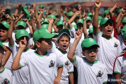 Palestinian children take part in a summer camp organized by Hamas movement in Gaza city on July 10, 2016. Hamas movement organized dozens of summer camps for Palestinian children during the period of school holidays. Ph...
