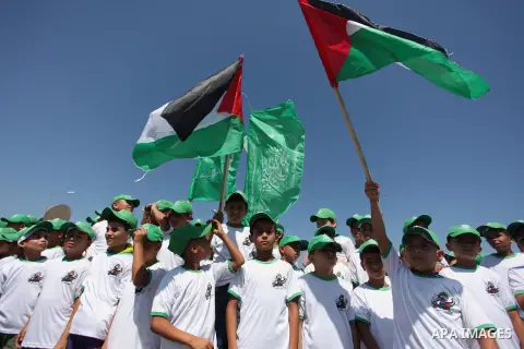 Palestinian children take part in a summer camp organized by Hamas movement in Gaza city on July 10, 2016. Hamas movement organized dozens of summer camps for Palestinian children during the period of school holidays. Ph...