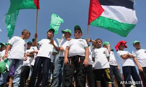 Palestinian children take part in a summer camp organized by Hamas movement in Gaza city on July 10, 2016. Hamas movement organized dozens of summer camps for Palestinian children during the period of school holidays. Ph...