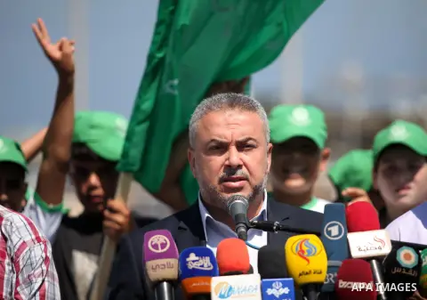 Senior Hamas Leader Ismail Redwan, speaks during a press conference to announce the start of summer camps organized by the Hamas movement in Gaza city on July 10, 2016. Hamas movement organized dozens of summer camps for...