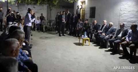 Palestinian Prime Minister Rami Hamdallah offers condolences to the Family of Palestinian Yasser Nazzal, in the West Bank, City of Jenin, on July 10, 2016. Photo by Prime Minister Office