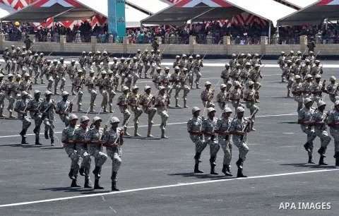 Egyptian forces demonstrate their skills during a military academy graduation ceremony in the capital, Cairo, on July 12, 2016. Photo by Egyptian President Office