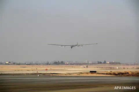 Solar Impulse 2, the solar powered plane, lands at Cairo International Airport on July 13, 2016, for the penultimate stage of its world tour. The experimental plane had completed the first solo transatlantic flight power...