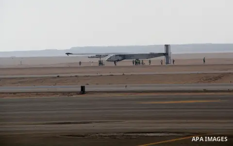 Solar Impulse 2, the solar powered plane, lands at Cairo International Airport on July 13, 2016, for the penultimate stage of its world tour. The experimental plane had completed the first solo transatlantic flight power...