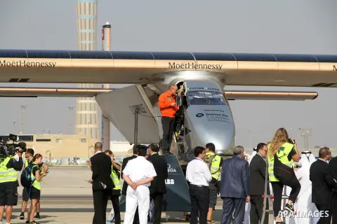 Solar Impulse 2, the solar powered plane, lands at Cairo International Airport on July 13, 2016, for the penultimate stage of its world tour. The experimental plane had completed the first solo transatlantic flight power...