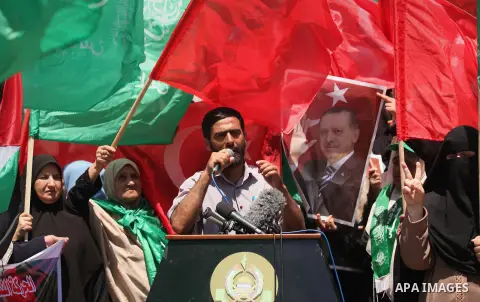 Mushir Al Masri, a Hamas MP and media spokesman speaks during a protest against the military coup attempt in Turkey, during a demonstration in Gaza City, on July 17, 2016. Turkish authorities wrested back control of the...