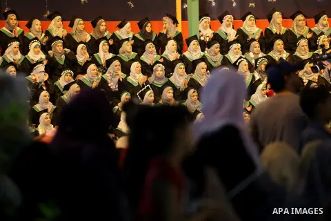 Palestinian students participate in their graduation ceremony at the University College of Applied Sciences in Gaza city on July 17, 2016. Photo by Mohammed Asad