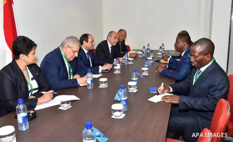 Egyptian President Abdel Fattah al-Sisi meets with Ghana President John Mahama, in Kigali, Rwanda, on July 17, 2016. Photo by Egyptian President Office