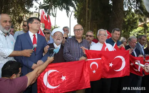 Turkish Consul, Mustafa Sarnic, take part in a protest against the military coup attempt in Turkey, in front of the Turkish consulate in east Jerusalem on July 18, 2016. Photo by Mahfouz Abu Turk