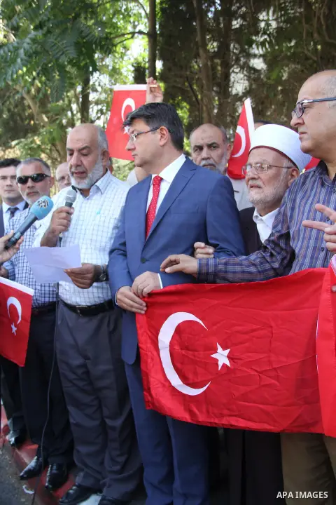 Turkish Consul, Mustafa Sarnic, take part in a protest against the military coup attempt in Turkey, in front of the Turkish consulate in east Jerusalem on July 18, 2016. Photo by Mahfouz Abu Turk