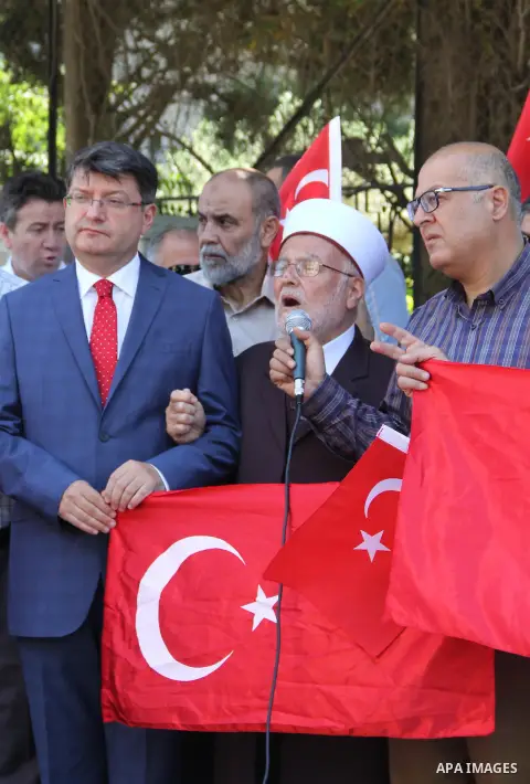 Turkish Consul, Mustafa Sarnic, take part in a protest against the military coup attempt in Turkey, in front of the Turkish consulate in east Jerusalem on July 18, 2016. Photo by Mahfouz Abu Turk