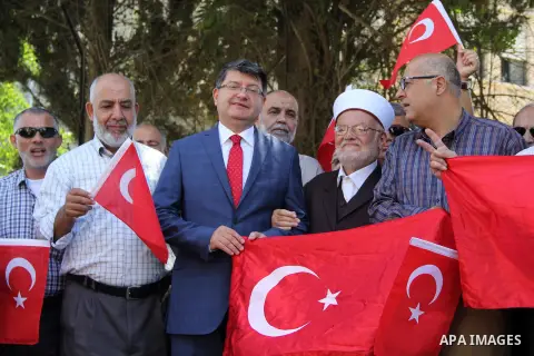 Turkish Consul, Mustafa Sarnic, take part in a protest against the military coup attempt in Turkey, in front of the Turkish consulate in east Jerusalem on July 18, 2016. Photo by Mahfouz Abu Turk
