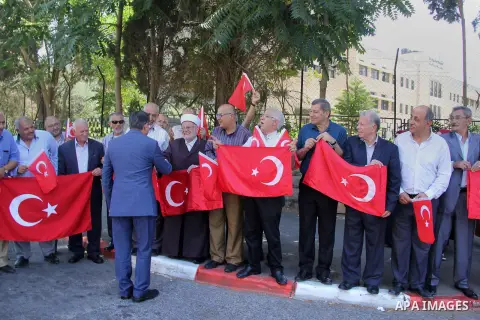 Turkish Consul, Mustafa Sarnic, take part in a protest against the military coup attempt in Turkey, in front of the Turkish consulate in east Jerusalem on July 18, 2016. Photo by Mahfouz Abu Turk