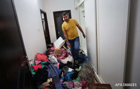 Palestinians inspect their room after the Israeli soldiers raided their family house, at Kafr Qalil village near the West Bank city of Nablus, on July 21, 2016. Photo by Nedal Eshtayah
