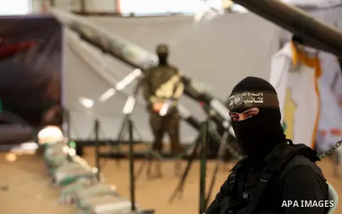 A picture taken on July 21, 2016 shows weapons during a weapon exhibition at a Hamas-run youth summer camp, in Gaza City. Photo by Ashraf Amra