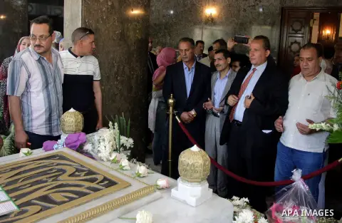 Egyptians visit the grave of former Egyptian President Gamal Abdel Nasser, on the occasion of the 64th anniversary of July 23 revolution, in Cairo, on July 23, 2016. Photo by Amr Sayed