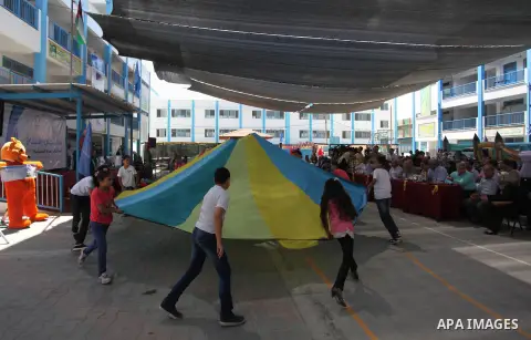 Palestinian youth enjoy as part of the activities proposed during a summer camp organised by the United Nations on July 23, 2016 in Gaza City. Photo by Ashraf Amra
