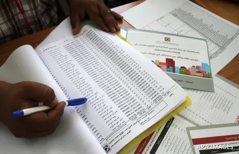 Palestinians from Central Elections Commission (CEO) work at Voter registration centers in Rafah in the southern Gaza strip on July 23, 2016. The Palestinian Central Elections Commission (CEO) announced Saturday that vot...
