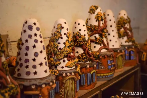 Pottery vessels are seen drying at a pottery workshop in Cairo, on July 24, 2016. Pottery is an ancient and traditional craft in Egypt. Local workshops usually produce products such as bowls, pitchers, flower pots, and v...