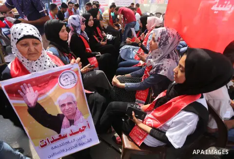 Supporters of the Popular Front for the Liberation of Palestine (PFLP) take part in a protest demanding for the release of Bilal Kayed a Palestinian prisoner on hunger strike,, in front of Red cross office, in Gaza city...