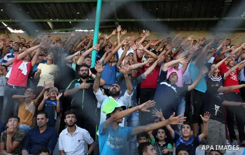 Palestinian spectators watch the first leg of the Palestine Cup final soccer match between Gaza Strip's Khan Younis Youth and Hebron's Al-Ahly at al-Yarmouk stadium in Gaza City July 26, 2016. Photo by Ashraf Amra