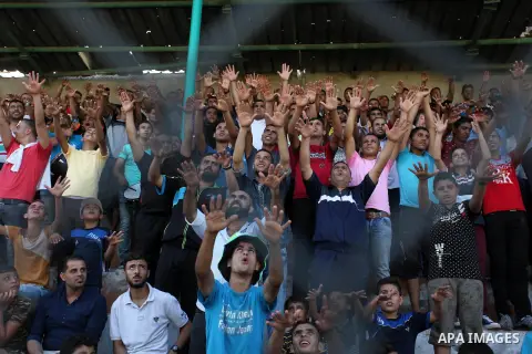 Palestinian spectators watch the first leg of the Palestine Cup final soccer match between Gaza Strip's Khan Younis Youth and Hebron's Al-Ahly at al-Yarmouk stadium in Gaza City July 26, 2016. Photo by Ashraf Amra