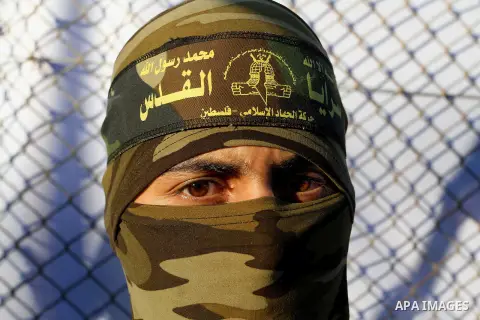 Palestinian militants from the Al-Quds Brigades, the armed wing of the Islamic Jihad movement, take part in a rally in Rafah in the southern Gaza Strip on July 28, 2016. Photo by Abed Rahim Khatib