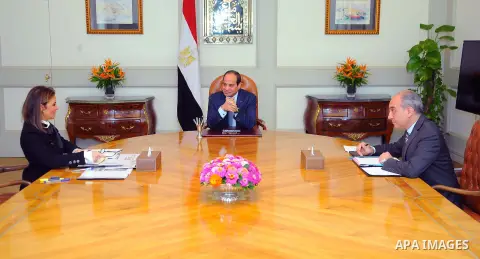 Egyptian President Abdel Fattah al-Sisi meets with Sahar Nasr, Egyptian Minister of International Cooperation, in Cairo, Egypt, on July 31, 2016. Photo by Egyptian President Office