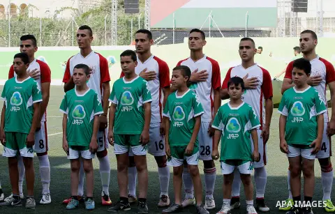 Palestinian players of Gaza's Shabab Khan Yunis pose for a picture before a second leg match for the Palestinian Cup final on August 2, 2016 at Hussein Bin Ali Stadium in the West Bank city of Hebron. The match had origi...