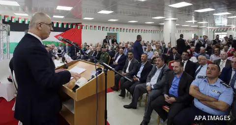 Palestinian Prime Minister Rami Hamdallah attends the opening ceremony of the new wing operations of Alia governmental hospital, in the West Bank city of Hebron, on Aug. 03, 2016. Photo by Prime Minister Office