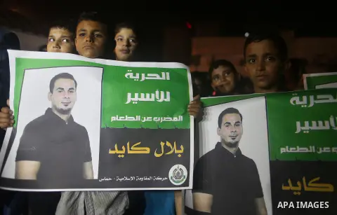 Palestinian children take part in a protest demanding for the release of Bilal Kayed a Palestinian prisoner on hunger strike, in Gaza city, on Aug. 03, 2016. Kayed who was due to be released after serving a 14-and-a-half...
