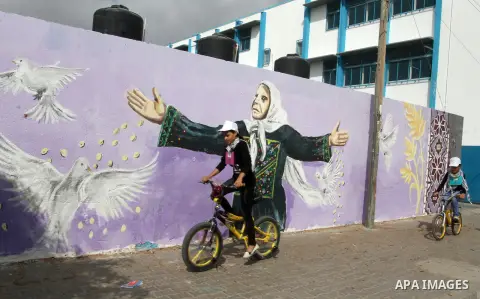 Palestinian children take part in the bicycles marathon to demand their right to play and break the siege on Gaza strip, in Rafah in the southern Gaza Strip. on August 7, 2016. Photo by Abed Rahim Khatib