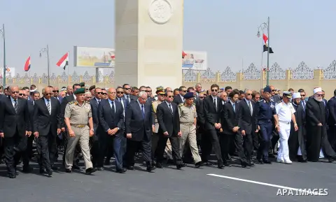 Egyptian President Abdel Fattah al-Sisi walks during a military funeral ceremony with Egyptian government officials and relatives of Egyptian-American Ahmed Zewail world's Nobel Prize in chemistry, who died last Tuesday...