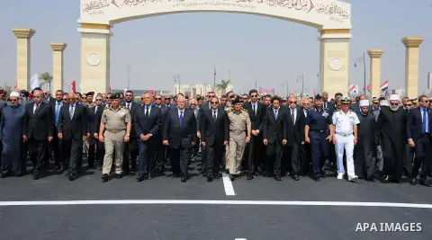 Egyptian President Abdel Fattah al-Sisi walks during a military funeral ceremony with Egyptian government officials and relatives of Egyptian-American Ahmed Zewail world's Nobel Prize in chemistry, who died last Tuesday...