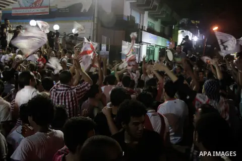 Fans of Zamalek football club celebrate winning the Egypt Cup after Egypt Cup final match against Al Ahli club in Borg El-Arab Stadium near Alexandria, Egypt, Aug 8,2016. Photo by Stringer