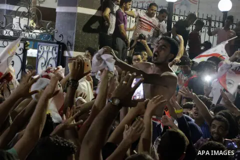 Fans of Zamalek football club celebrate winning the Egypt Cup after Egypt Cup final match against Al Ahli club in Borg El-Arab Stadium near Alexandria, Egypt, Aug 8,2016. Photo by Stringer