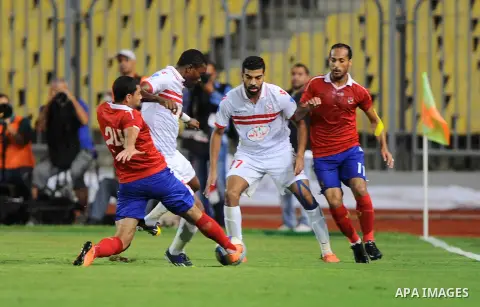 Al-Zamalek players and Al Ahli players compete during final match of Egypt Cup in Borg El-Arab Stadium near Alexandria, Egypt, Aug 8,2016. Photo by Stringer