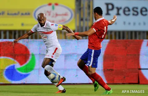 Al-Zamalek players and Al Ahli players compete during final match of Egypt Cup in Borg El-Arab Stadium near Alexandria, Egypt, Aug 8,2016. Photo by Stringer