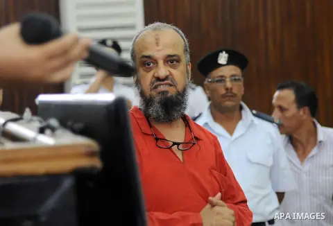 An Egyptian Muslim Brotherhood defendant speaks to judges during his trial in a case known in media as "Rabaa Operations Room", in Cairo, on Aug. 09, 2016. Photo by Amr Sayed