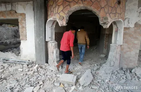 Relatives check the damage to the family house of Palestinian assailant Mohammad Tarayra after it was partially blown up by Israeli troops in the West Bank village of Bani Naem, east of Hebron August 15, 2016. Photo by W...