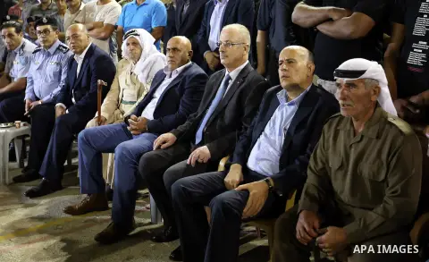 Palestininan Prime Minister, Rami Hamdallah, attends the funeral of the martyr Shibley Bani Shamsa and Mahmoud Altaraireh, in the West Bank, City of Nablus on August 20, 2016. Photo by Prime Minister Office