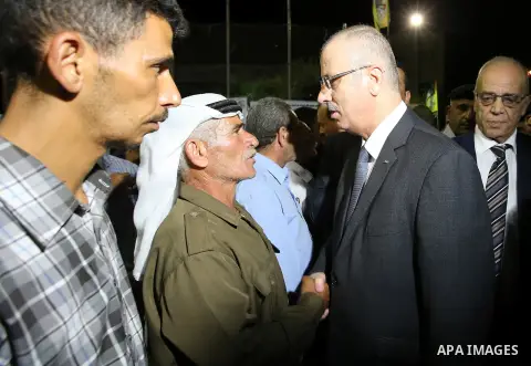 Palestininan Prime Minister, Rami Hamdallah, attends the funeral of the martyr Shibley Bani Shamsa and Mahmoud Altaraireh, in the West Bank, City of Nablus on August 20, 2016. Photo by Prime Minister Office