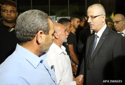 Palestininan Prime Minister, Rami Hamdallah, attends the funeral of the martyr Shibley Bani Shamsa and Mahmoud Altaraireh, in the West Bank, City of Nablus on August 20, 2016. Photo by Prime Minister Office