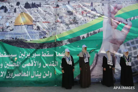 Palestinian women attend the opening of the Jerusalem Committee camps ceremony, in Gaza city, on August 21, 2016. Photo by Mohammed Asad
