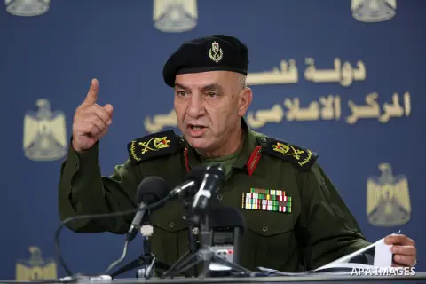 A spokesman for the security services, Major General, Adnan Al-damiri, speaks during a press conference, in the West bank city of Ramallah, on August 21, 2016. Photo by Shadi Hatem