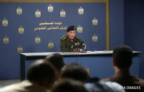A spokesman for the security services, Major General, Adnan Al-damiri, speaks during a press conference, in the West bank city of Ramallah, on August 21, 2016. Photo by Shadi Hatem