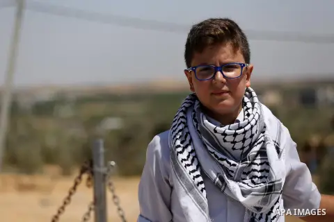 Palestinian band Sanawnaw, who were denied access to perform the festival at Bethlehem, take part in a protest against the denial in Beit Hanun, near the Erez crossing point with Israel, in the northern Gaza Strip on Aug...